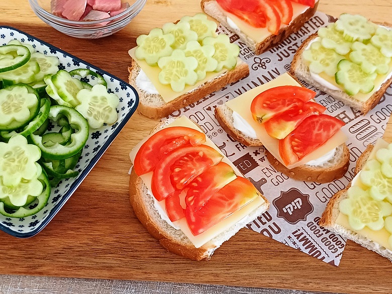 Yellow cheese sandwich with white cheese and vegetables