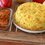 Yellow rice with carrots and peas